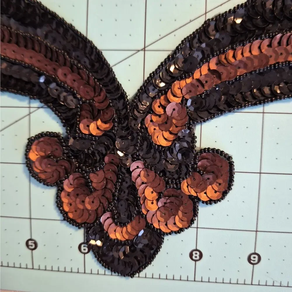 Bronze and black sequin and bead neckline applique